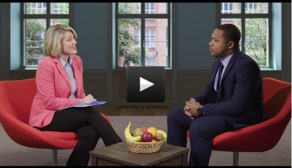 Carolyn Williams sits down with a client in a counselor-client interaction. 